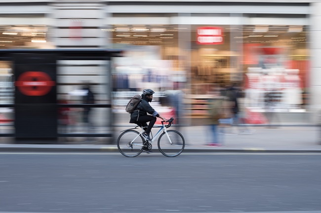 Employee cycling to work